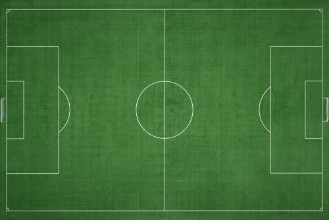 Bild på Green Grass Football Field