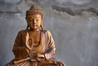 Bild på Wooden buddha statue