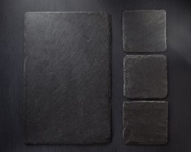 Afbeeldingen van Slate stone at wooden background