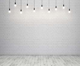 Afbeeldingen van Painted brick wall and wooden floor with glowing light bulbs 3D rendering