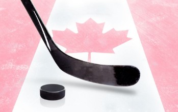 Bild på Hockey Stick and Puck With Canadian Flag on Ice