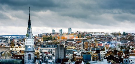 Afbeeldingen van Tower of Notre-Dame des Rcollets church and cityscape of Verviers with a dramatic sky