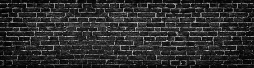 Afbeeldingen van Black brick wall wide panorama as a backdrop