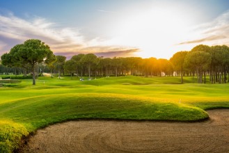 Golfové ihrisko pri západe slnka paveikslėlis