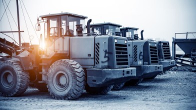Afbeeldingen van Neatly arranged excavators