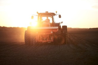 Picture of Red tractor plow field
