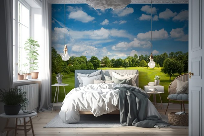 Afbeeldingen van Green golf field and blue cloudy sky