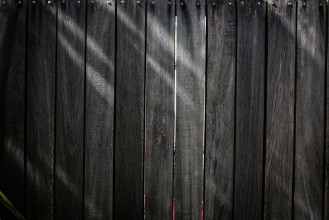 Afbeeldingen van Black wood plank background
