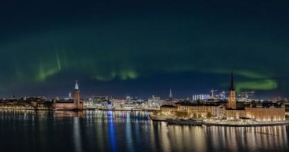 Northern Lights over Stockholm - f2350078 photowallpaper Wallpassion
