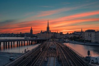 Sunset over Old Town of Stockholm photowallpaper Wallpassion