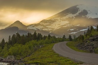 Sunset over Empty Road in Lapland photowallpaper Wallpassion