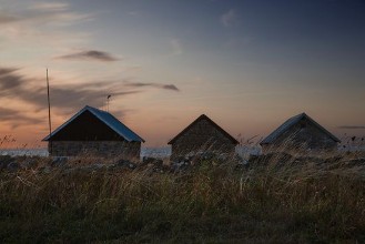 Fishing Huts in Evening Light on Oland photowallpaper Wallpassion