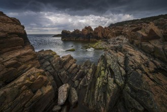 Rock formations on the coast of Hovs Hallar photowallpaper Wallpassion