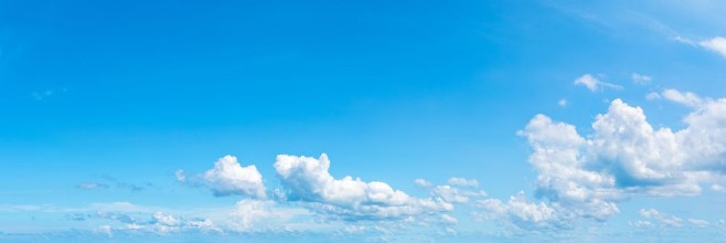 Panoramic fluffy cloud in the blue sky photowallpaper Scandiwall